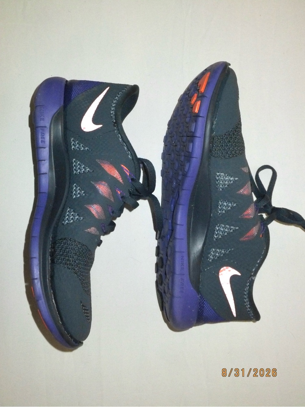 Women’s Nike Free Running Shoes- black pink purple 7.5